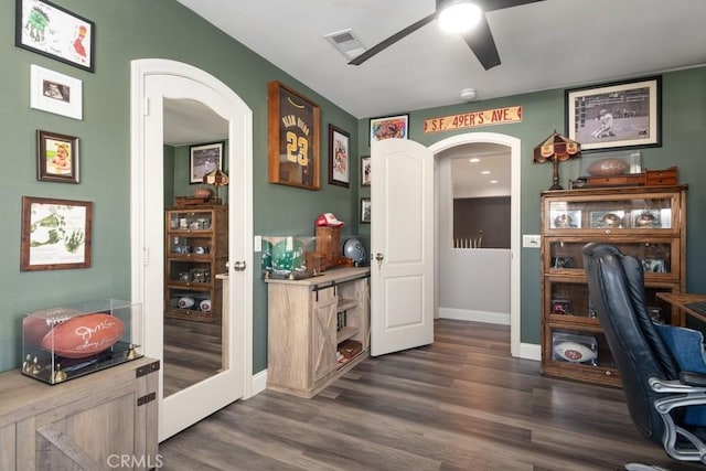 office featuring ceiling fan and dark hardwood / wood-style flooring