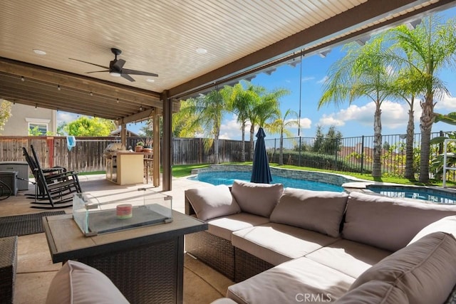 view of patio featuring an outdoor hangout area, a fenced in pool, and ceiling fan