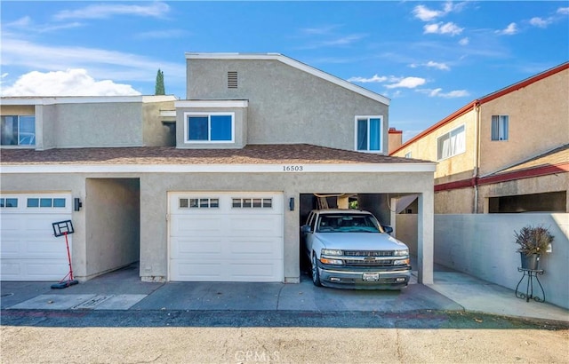 view of front of property featuring a garage