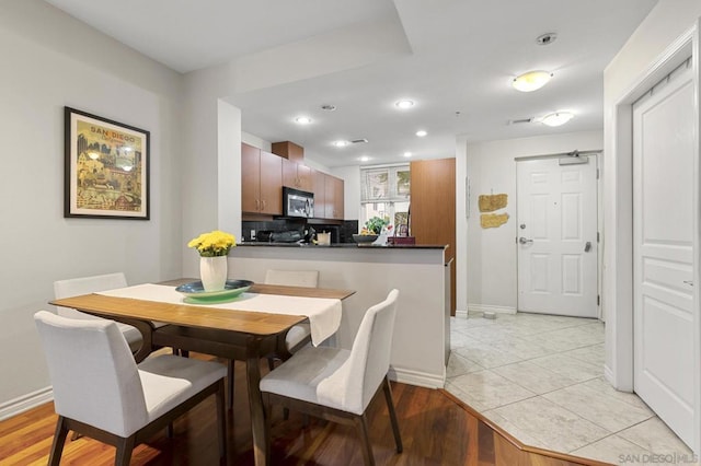 dining area featuring light hardwood / wood-style flooring