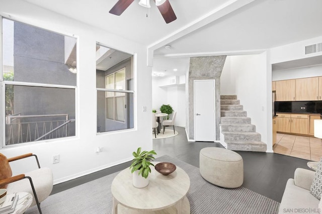 living room with ceiling fan