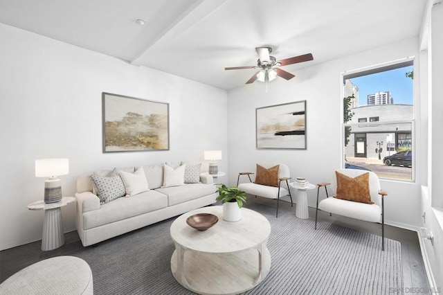 living room featuring dark hardwood / wood-style floors and ceiling fan