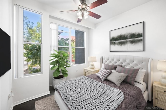 bedroom featuring hardwood / wood-style flooring and ceiling fan