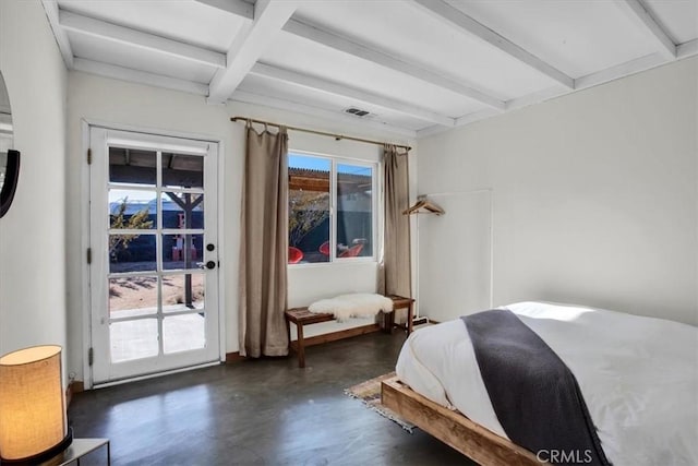 bedroom with beam ceiling