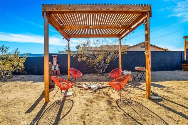 view of playground with a pergola