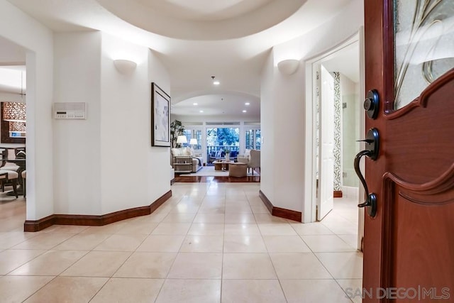 hallway featuring light tile patterned flooring