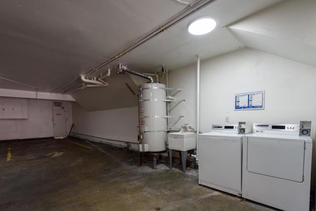 interior space featuring independent washer and dryer, sink, and secured water heater