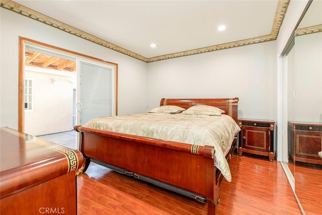 bedroom featuring hardwood / wood-style flooring