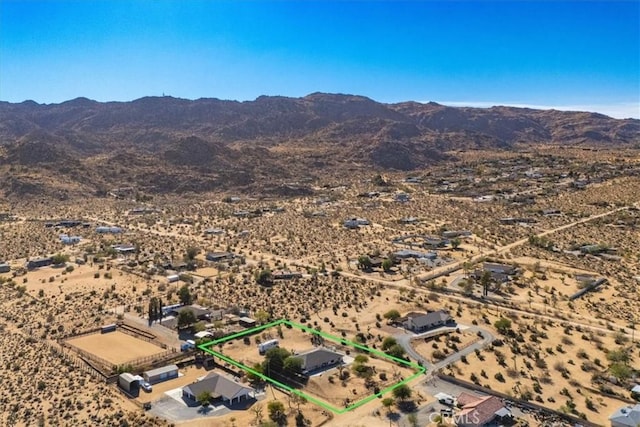 bird's eye view with a mountain view