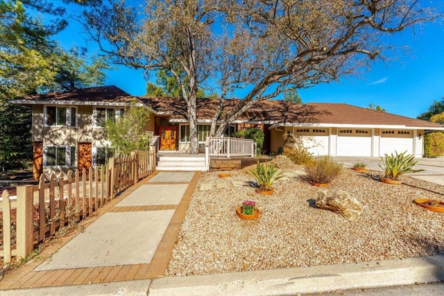 view of front of property with a garage