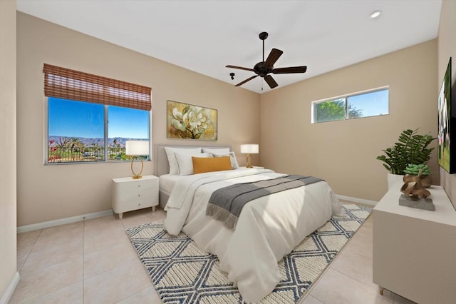 bedroom featuring ceiling fan and light tile patterned floors