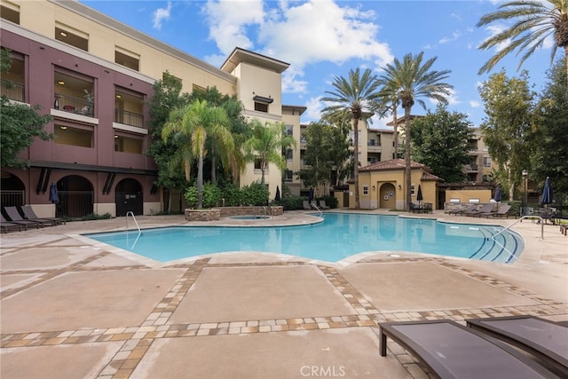 view of pool featuring a patio area