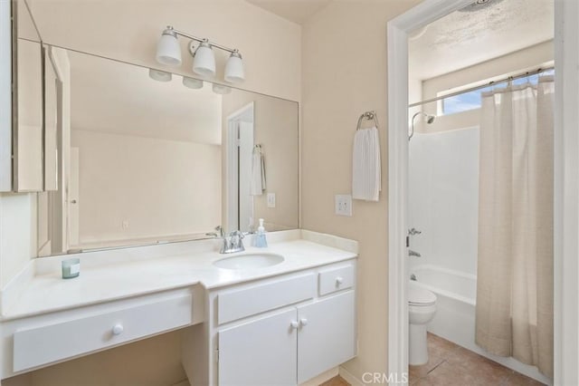 full bathroom featuring vanity, tile patterned flooring, toilet, and shower / bath combo with shower curtain