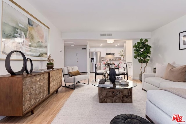 living room with light wood-type flooring