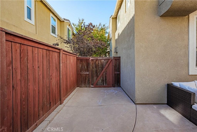 view of property exterior featuring a patio