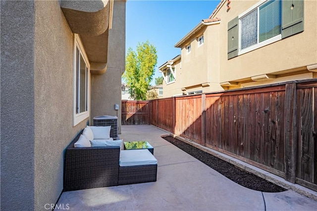 view of patio / terrace with central AC