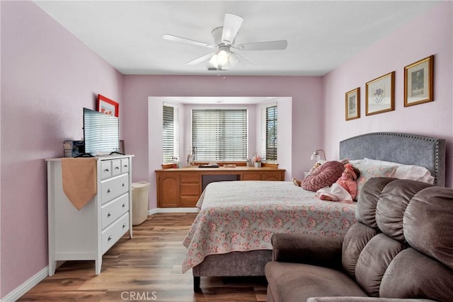 bedroom featuring ceiling fan and light wood-type flooring