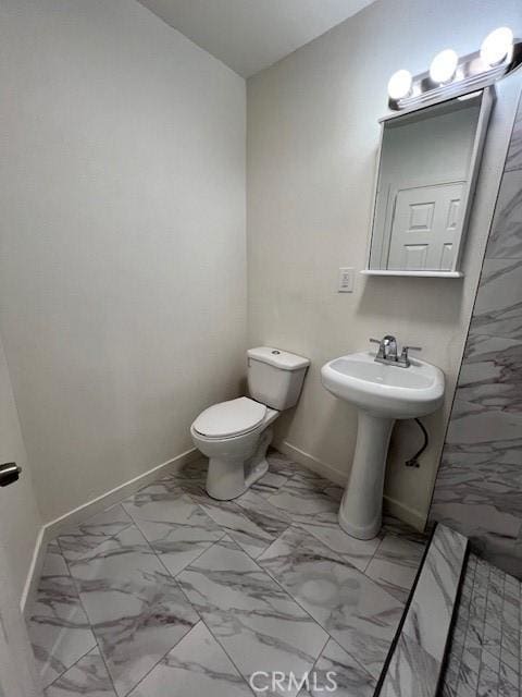 bathroom featuring toilet