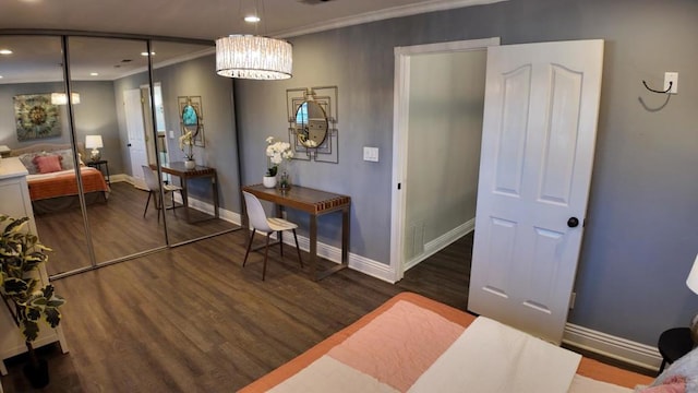 interior space featuring dark hardwood / wood-style flooring and ornamental molding