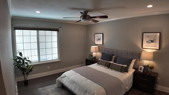 bedroom featuring multiple windows, crown molding, and ceiling fan