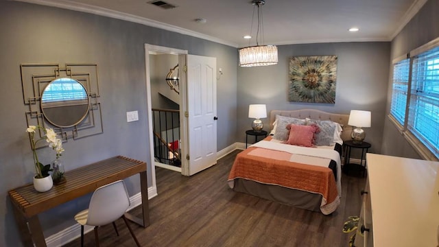 bedroom with crown molding, dark hardwood / wood-style floors, and multiple windows