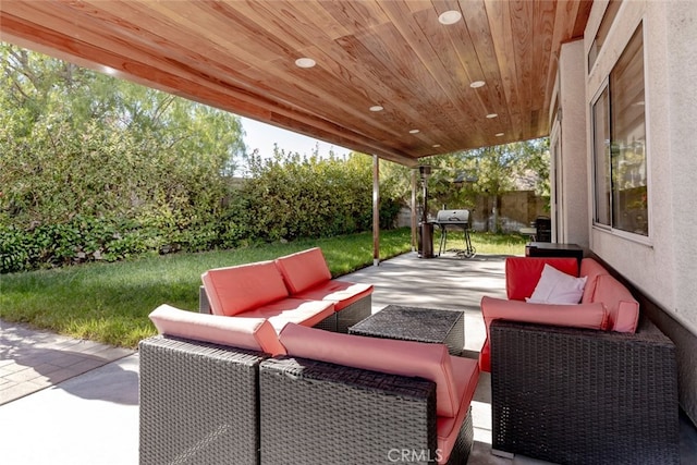 view of patio with a grill and an outdoor living space