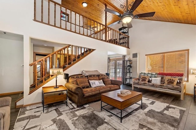 living room with ceiling fan, hardwood / wood-style floors, high vaulted ceiling, and wooden ceiling