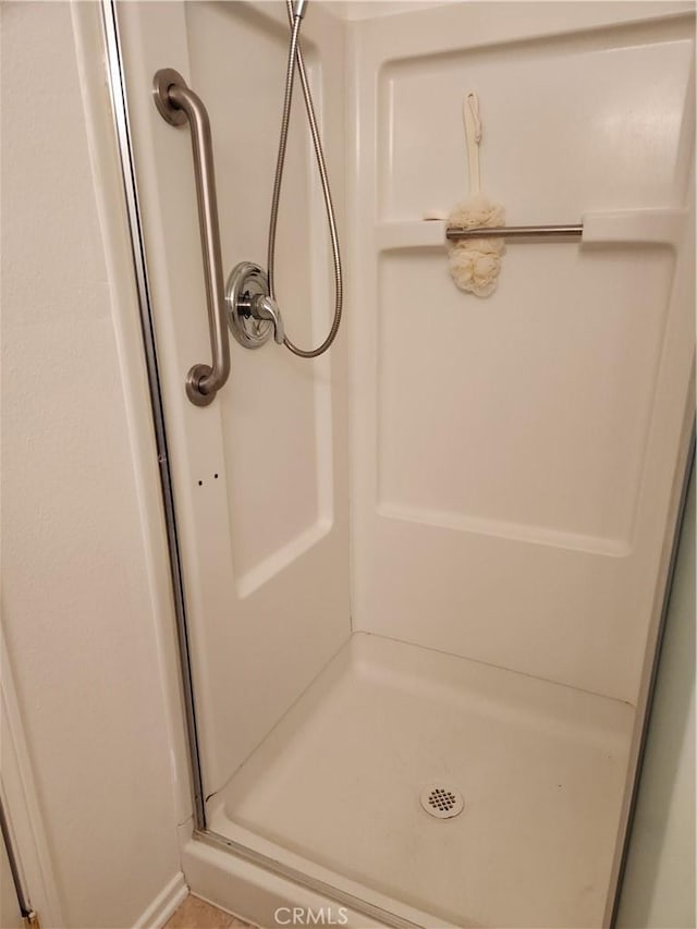 bathroom featuring walk in shower