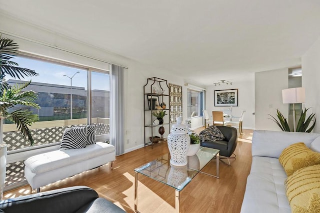 living room with light hardwood / wood-style floors