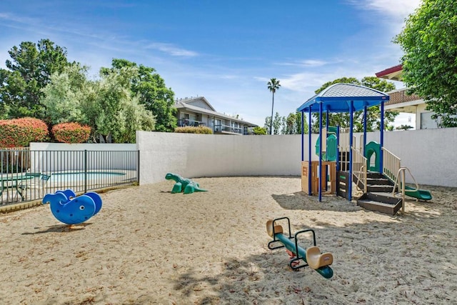 view of play area featuring a fenced in pool