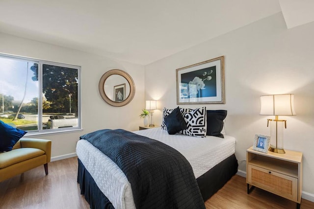 bedroom featuring wood-type flooring