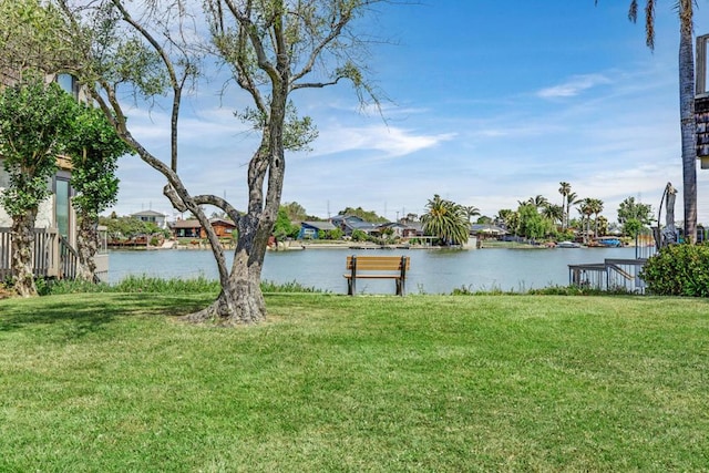 exterior space with a water view