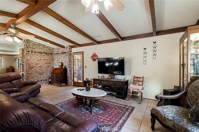 tiled living room featuring vaulted ceiling with beams, ceiling fan, and brick wall