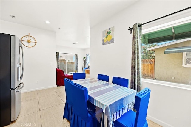 view of tiled dining space