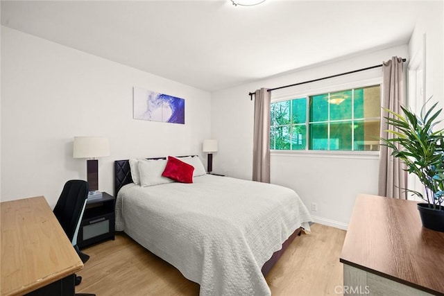 bedroom featuring light hardwood / wood-style flooring