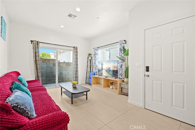 living room featuring light tile patterned floors