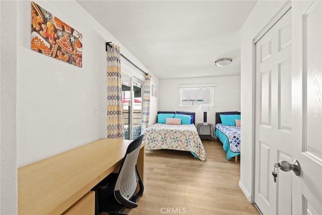 bedroom featuring light wood-type flooring