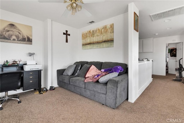 living room with carpet flooring and ceiling fan