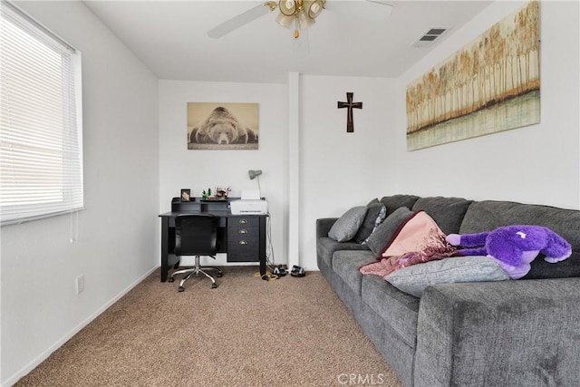 living room featuring carpet flooring and ceiling fan