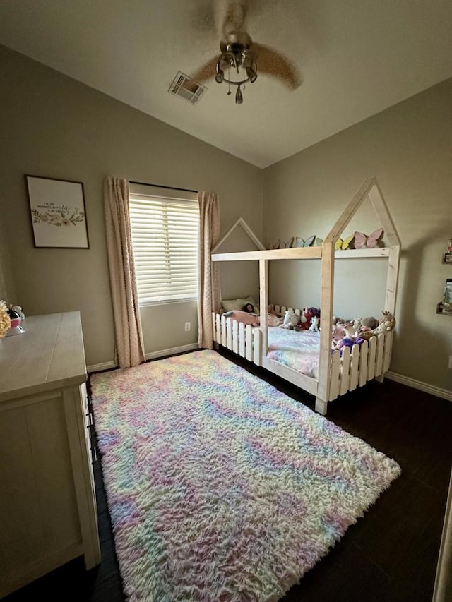 bedroom featuring ceiling fan and vaulted ceiling