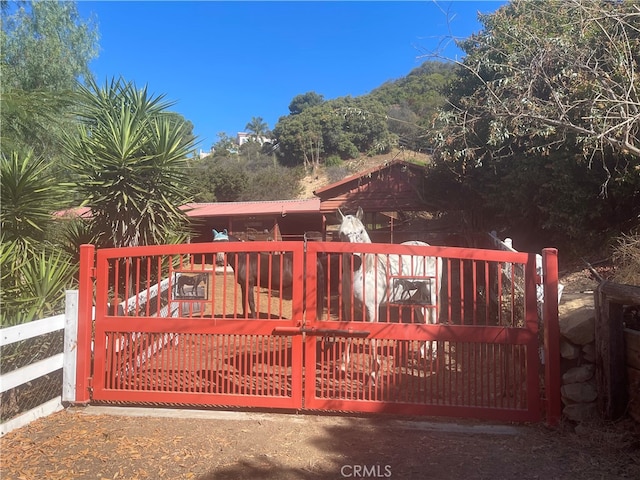 view of gate featuring a deck