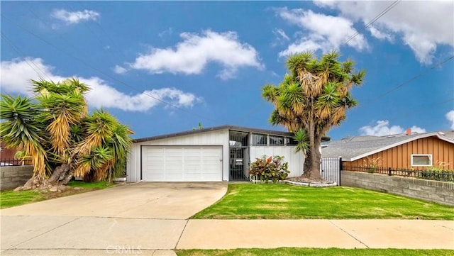 single story home with a garage and a front yard