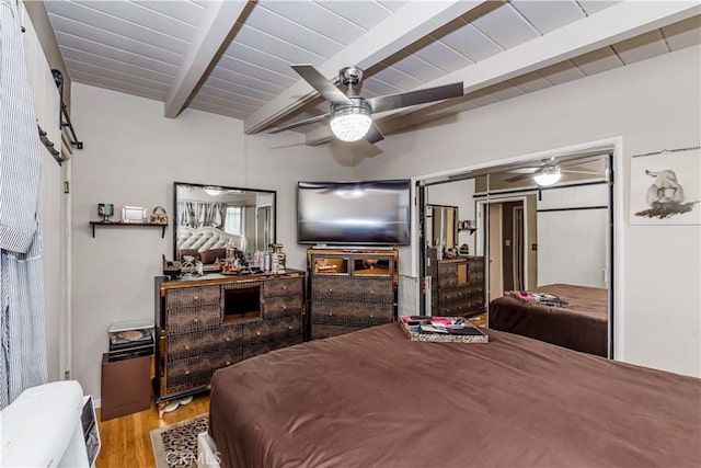 bedroom featuring wood ceiling, ceiling fan, beam ceiling, and light hardwood / wood-style floors