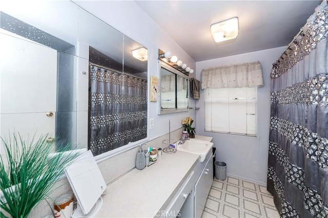 bathroom with vanity and a shower with curtain