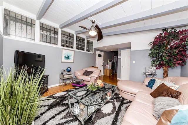 living room with hardwood / wood-style flooring, ceiling fan, beam ceiling, and wooden ceiling