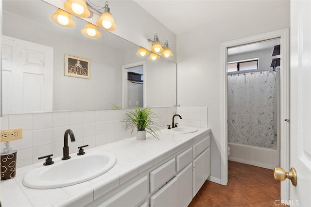 full bathroom featuring vanity, tile patterned floors, toilet, shower / bathtub combination with curtain, and tasteful backsplash