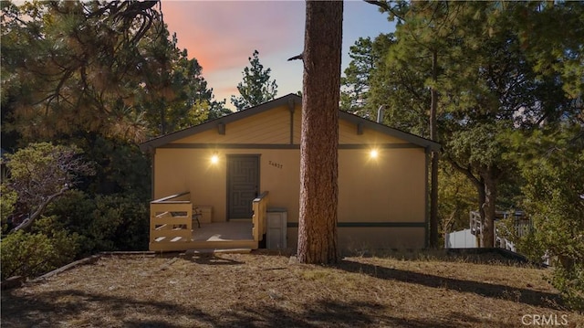 view of property exterior at dusk