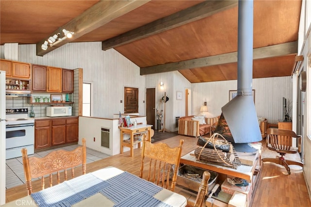 kitchen with wooden ceiling, lofted ceiling with beams, range hood, heating unit, and white appliances