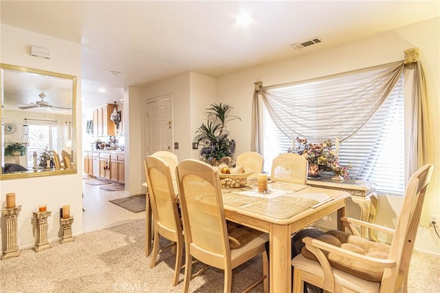 dining room with ceiling fan