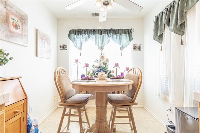 dining room featuring a wealth of natural light and ceiling fan